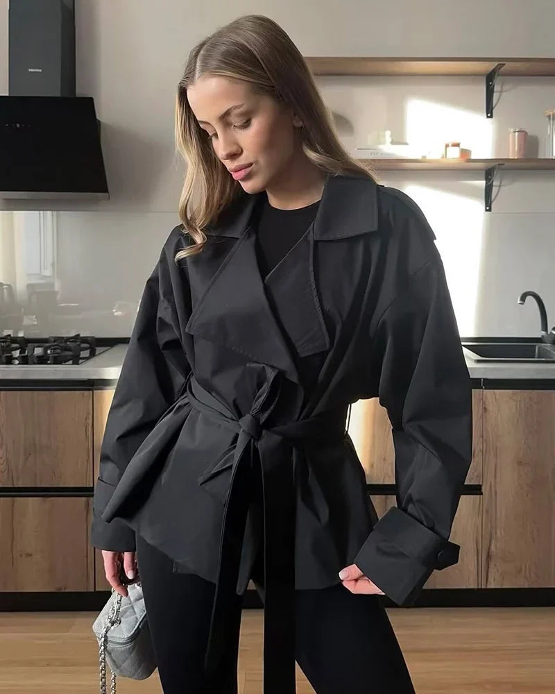 Lightweight belted trench jacket for women, great for unpredictable weather.