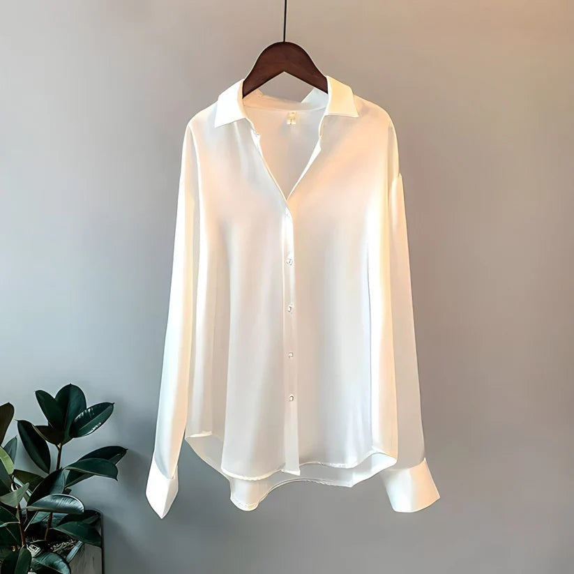 Collared long-sleeve flowy blouse for women, offering a sophisticated and elegant fashion style.