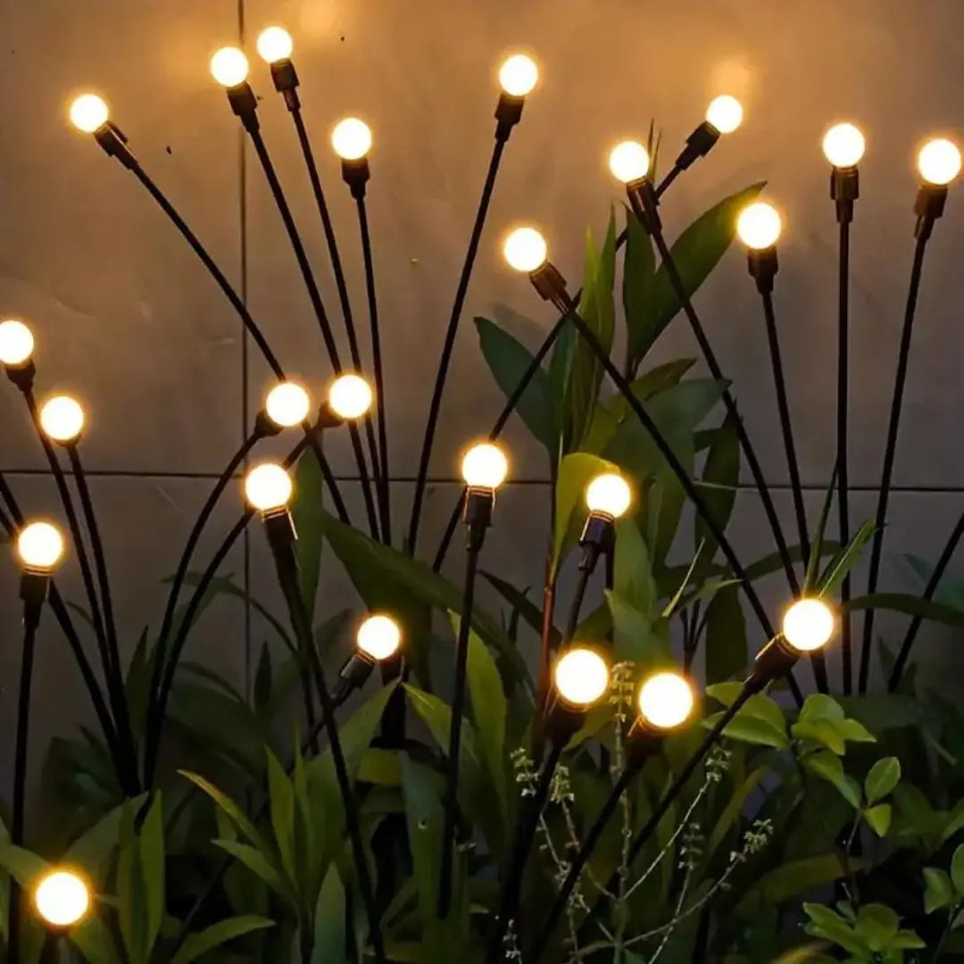 Decorative SunFlicker solar LED light for gardens. Wireless, waterproof, adds warm ambiance to outdoor spaces.