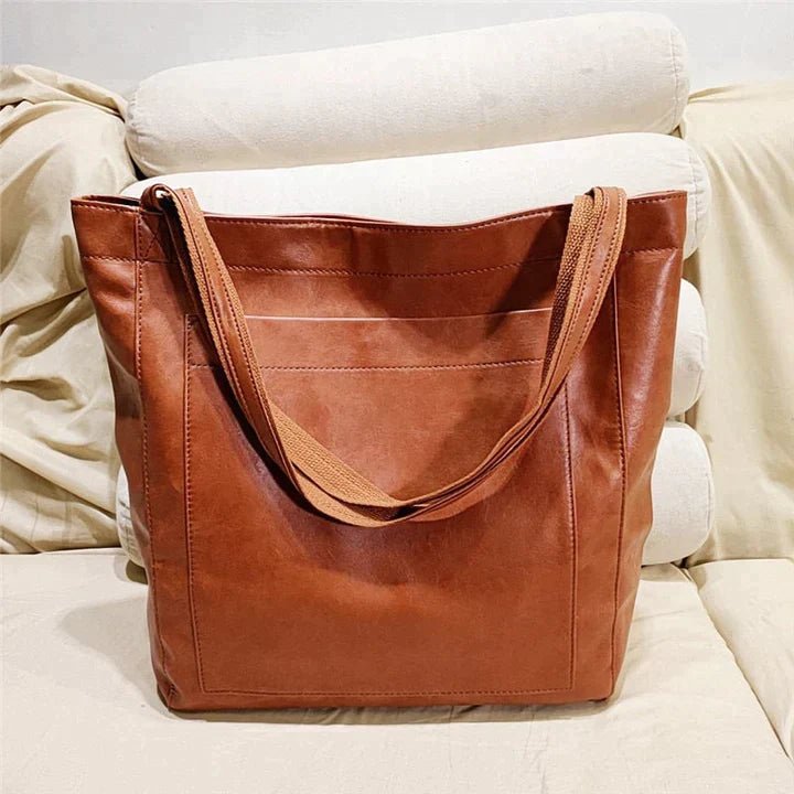 Stylish genuine leather shoulder bag for women, a versatile everyday handbag & fashion accessory with ample space.