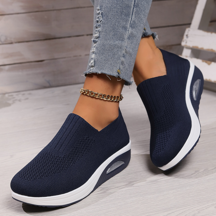 Casual women's orthopedic slip-on sneakers with comfort technology, perfect for everyday wear and support.
