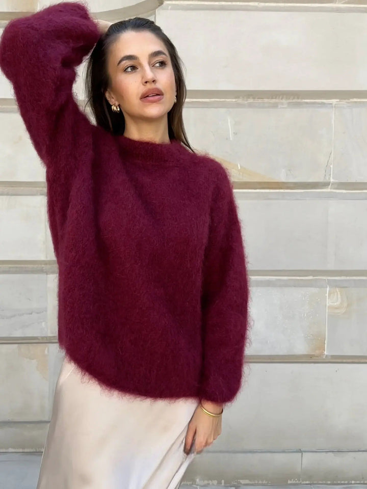 Soft knit women's top, a cozy and elegant sweater for comfortable winter wear and layering.