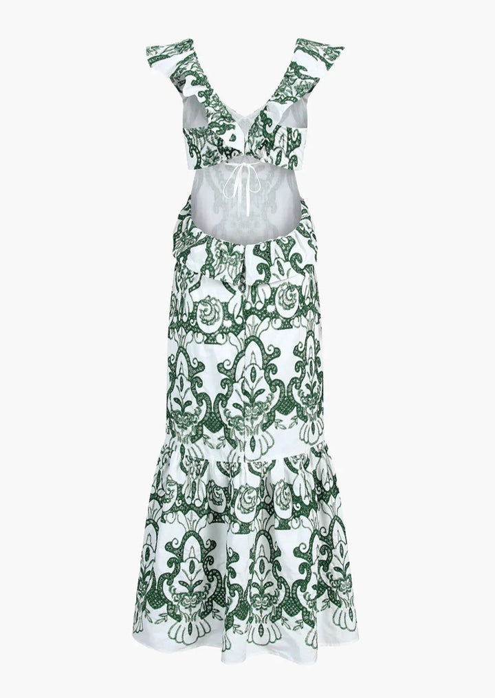 Flowy women's embroidered maxi dress, ideal for summer parties. Elegant vacation and resort fashion.