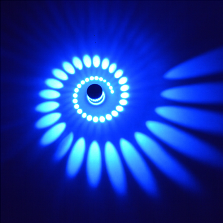 Contemporary spiral LED wall & ceiling light for ambient home decor. Nvroome's modern, energy-efficient fixture.