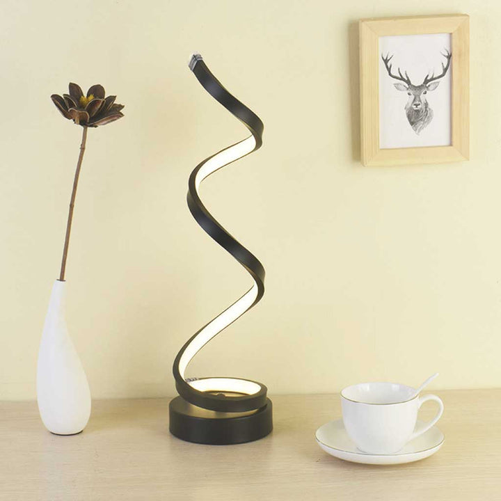 Contemporary LED spiral lamp with dimmable helix light, creating warm ambient illumination.