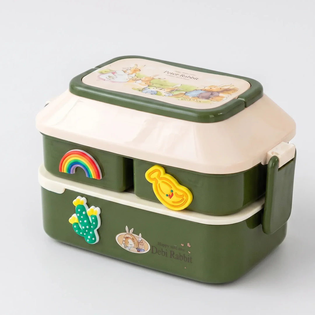Kids stackable bento lunch box with utensils, ready for a healthy school day meal. Portable & durable.