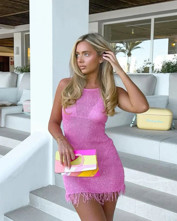 Elegant women's blue sequin mini dress, perfect for cocktails or a sparkling night out.