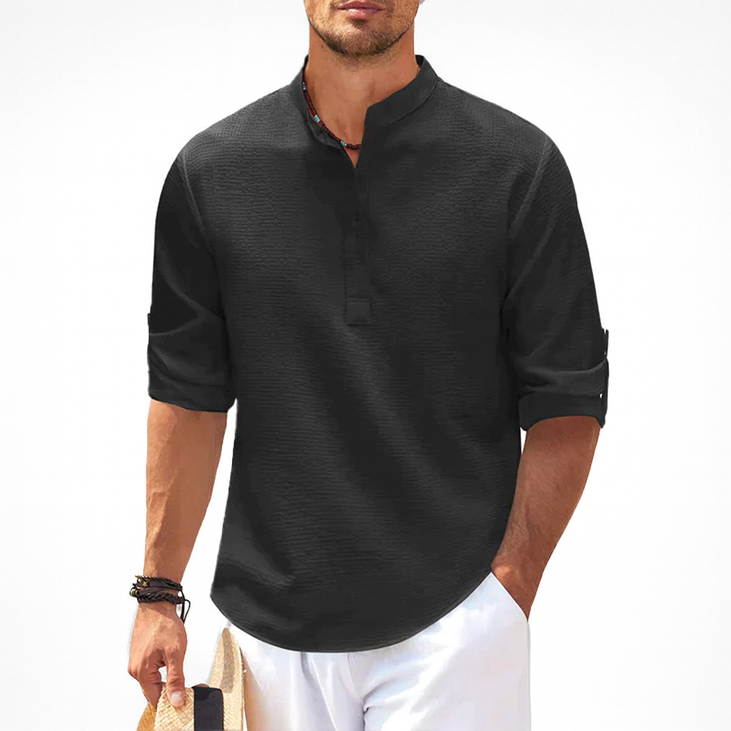 Textured men's casual Henley shirt. Long sleeve button top in soft, breathable fabric for daily comfort.