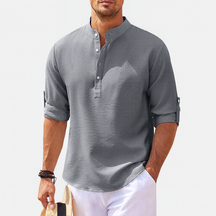 Classic men's Henley neck long sleeve top. Stylish casual shirt with buttons for everyday comfort.