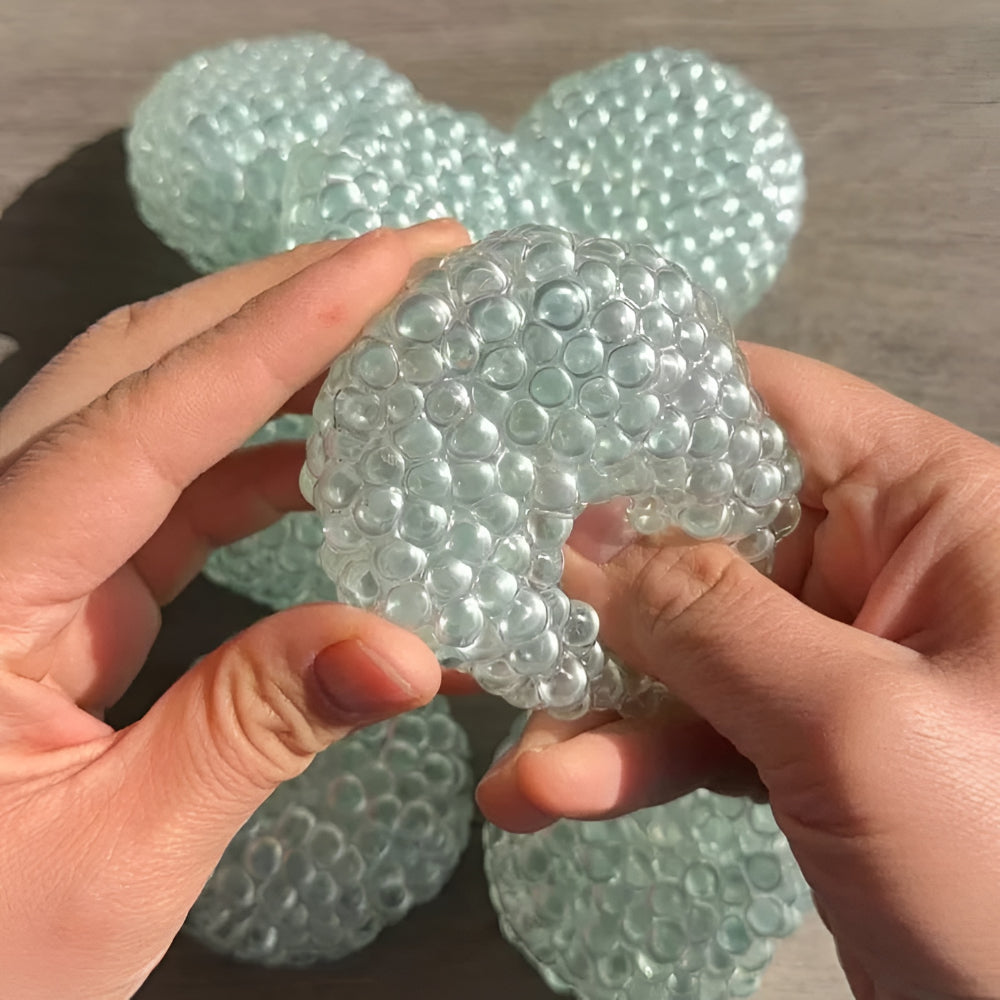 Relieve stress & anxiety with this unisex sensory fidget ball. Improves focus & provides a calming hand exerciser.