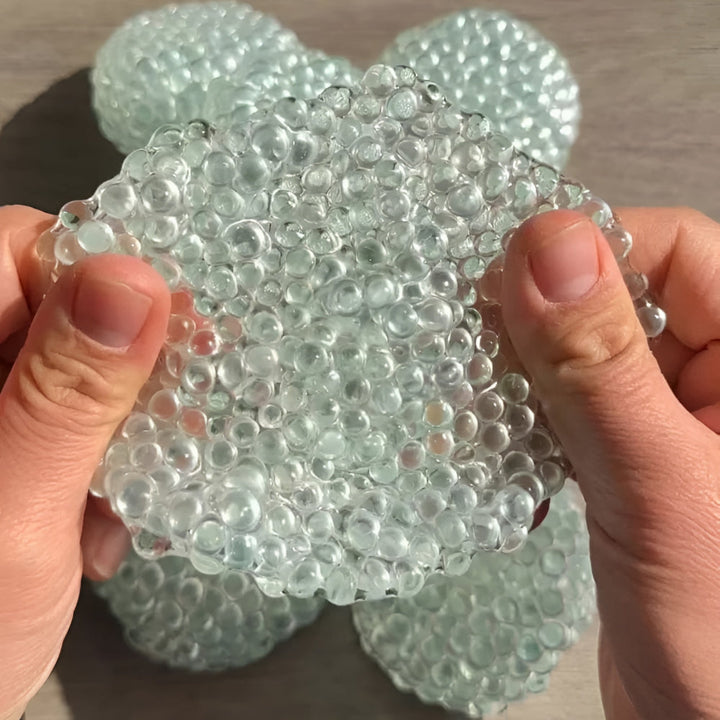Textured sensory fidget stress ball, a focus aid and anxiety relief tool for both kids and adults. Enhances calm.