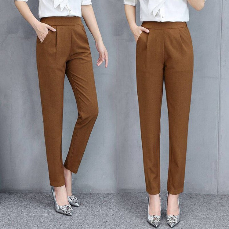 Chic women's Tinsley relaxed fit black pants with practical pockets, ideal for modern daily style.