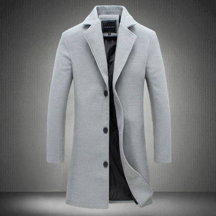 Refined men's classic long wool overcoat, suitable for formal menswear or stylish cold weather outerwear.