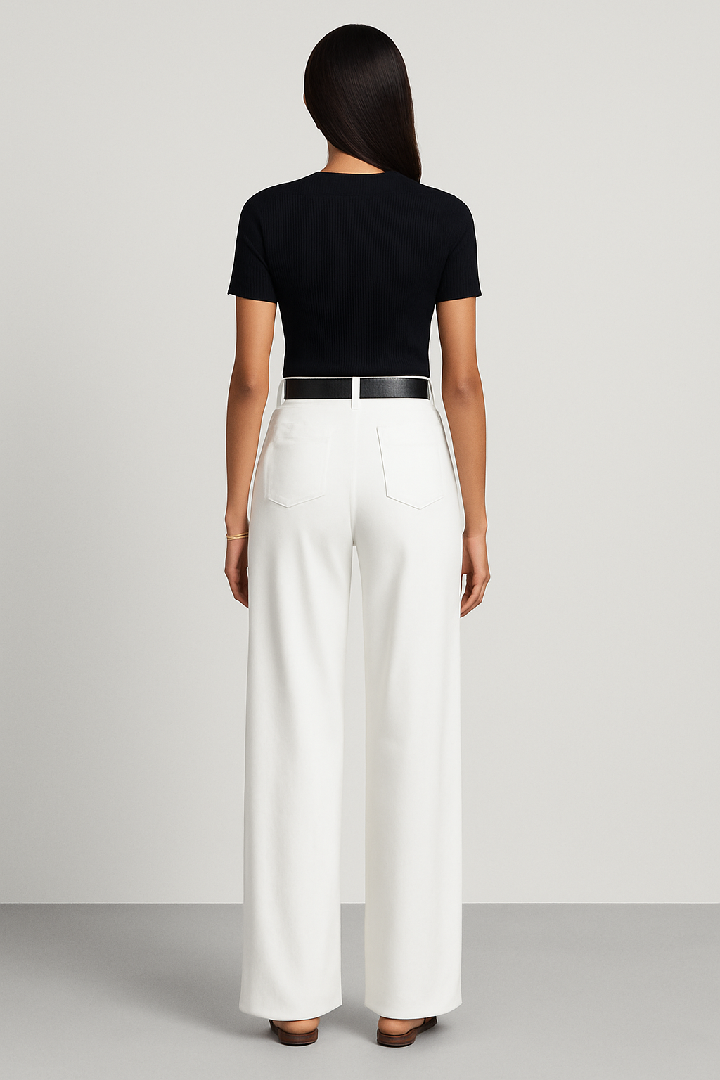Elegant women's wide-leg pants with a high-rise tailored fit, ideal for sophisticated office or versatile fashion.