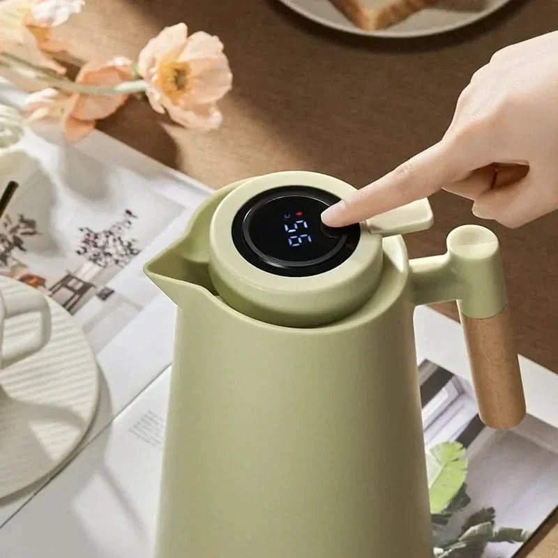 Smart temperature display 1L drinkware carafe, ideal for serving hot coffee, tea & other beverages.