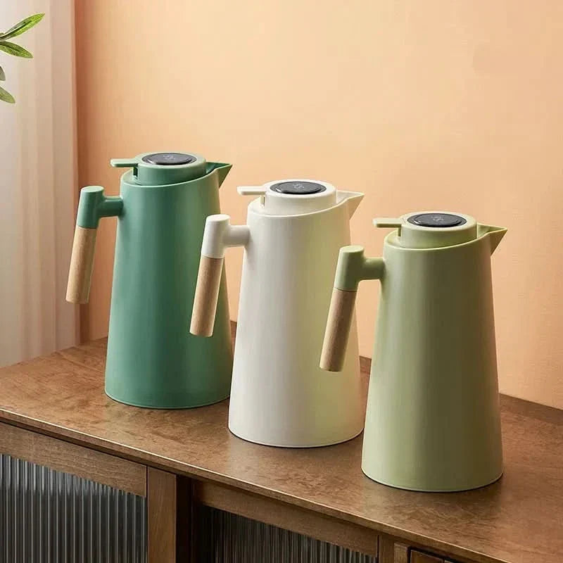 Modern 1-liter insulated coffee carafe with smart temperature display, great for daily hot drinks & kitchenware.