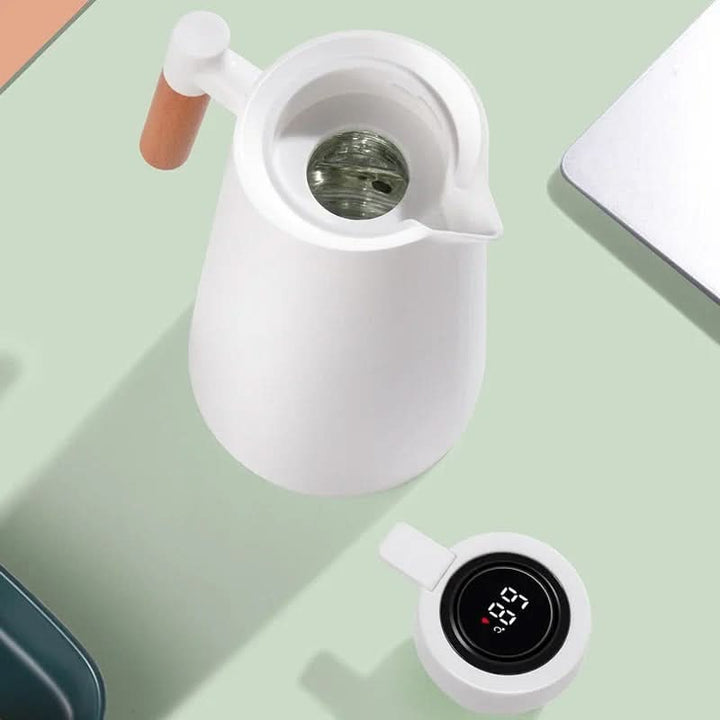 Sleek 1 liter insulated carafe for coffee & tea, a home essential with intelligent temperature display.