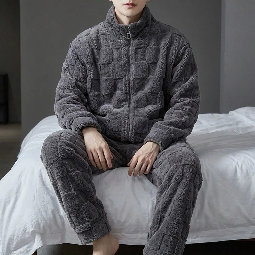 Men's warm winter pyjamas set in soft fabric, ideal for cozy lounging & comfortable sleep during cold weather.