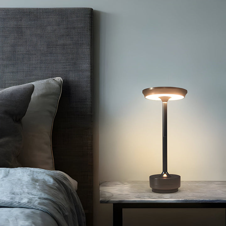 Slim modern cordless LED table lamp, dimmable for ambiance. Ideal accent light for contemporary home decor.