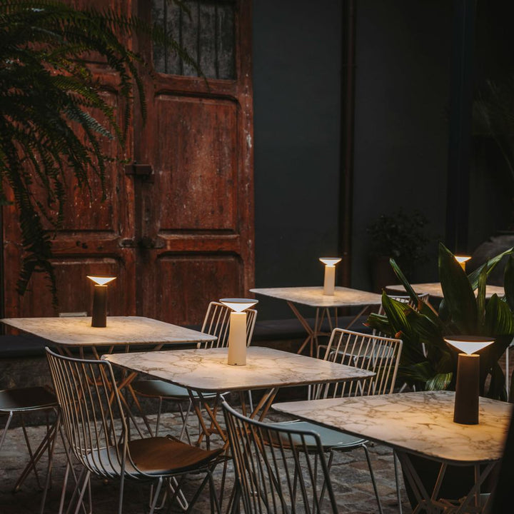 White modern LED table lamp, dimmable, rechargeable, wireless for any desk.