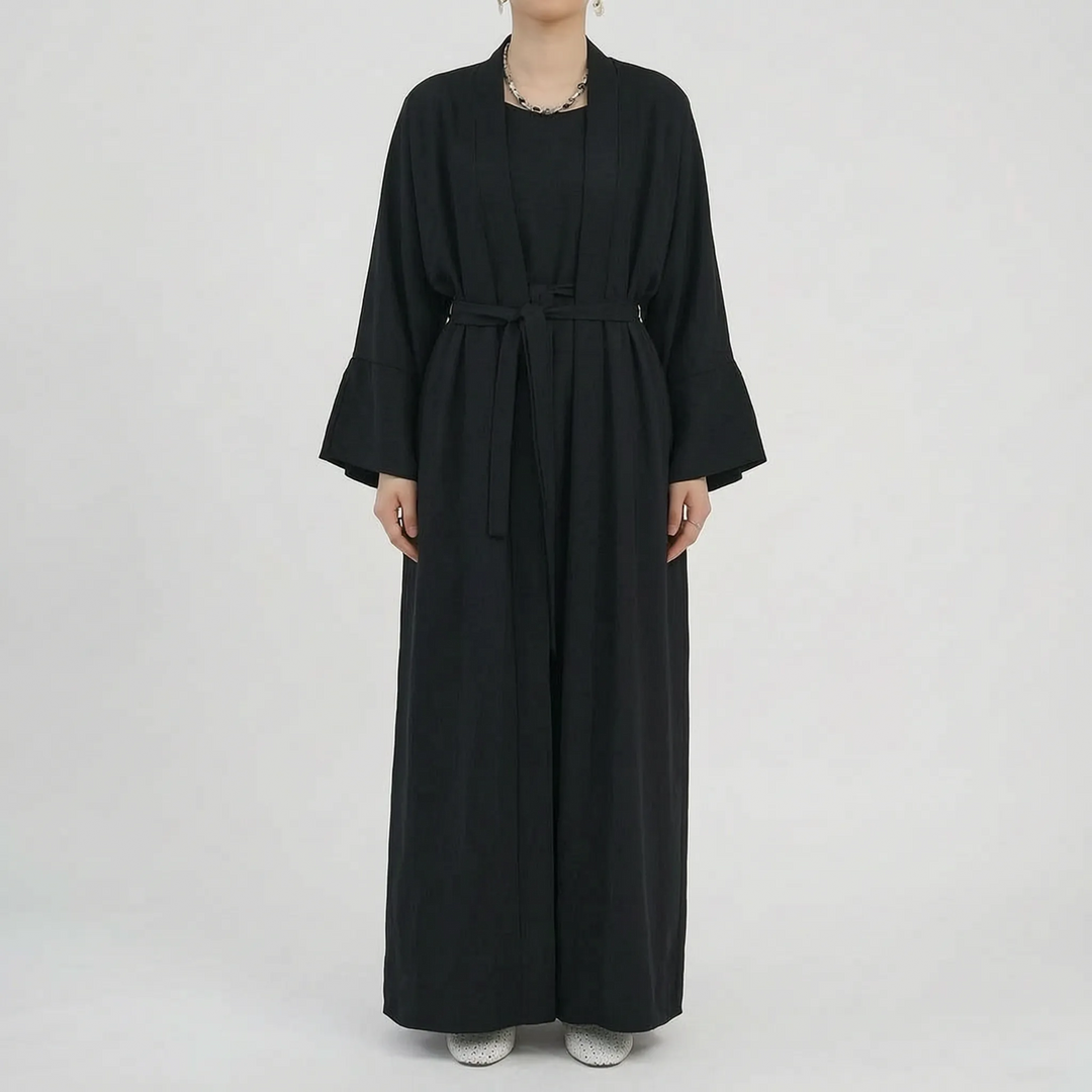 Stylish women's two-piece abaya set, blending modern modest fashion with comfort and ease.