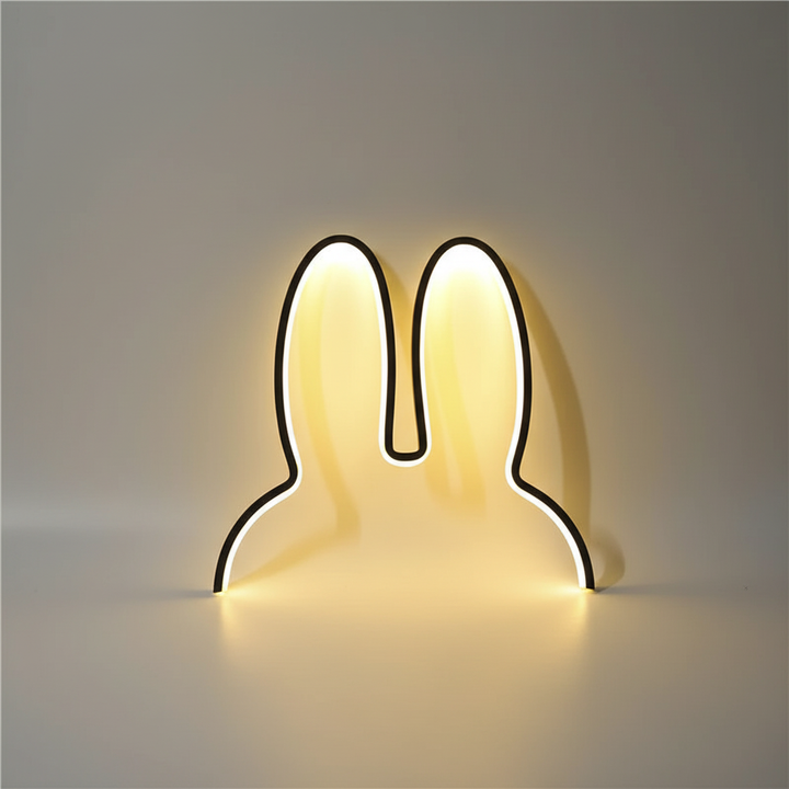 Unisex MoonEars LED night light, portable & rechargeable for kids' room or home decor. Gentle ambient light.