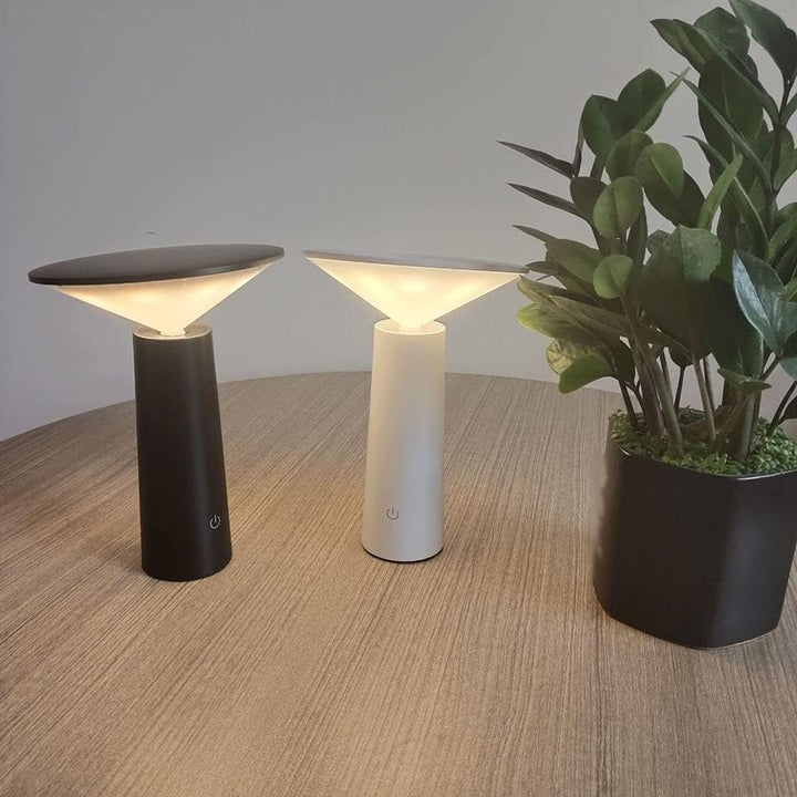Energy-efficient modern dimmable LED desk lamp, rechargeable & portable lighting solution.
