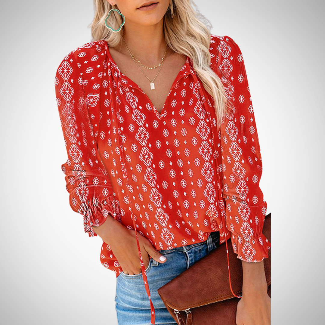 Women's printed V-neck blouse, long sleeve, flowy top. Versatile for casual & office wear.