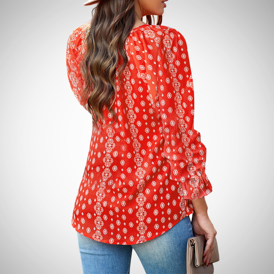 Chic women's floral print V-neck blouse, long sleeve. Flowy top for stylish comfort.