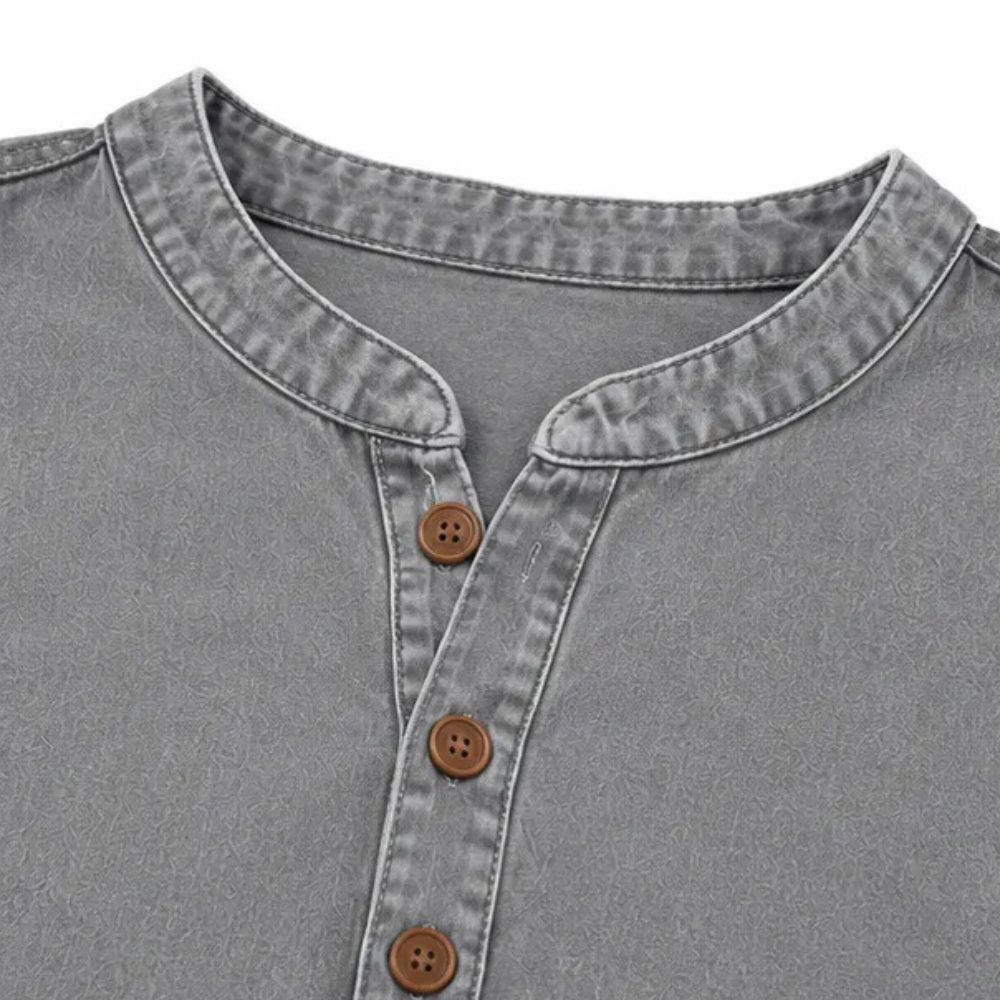 White women's Henley tunic shirt, comfortable short sleeve design with elegant side buttons.