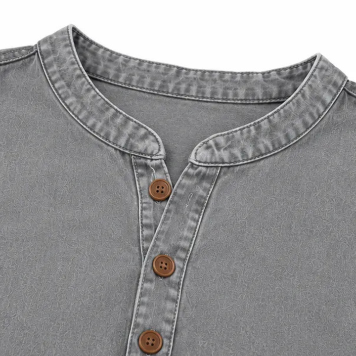 White women's Henley tunic shirt, comfortable short sleeve design with elegant side buttons.