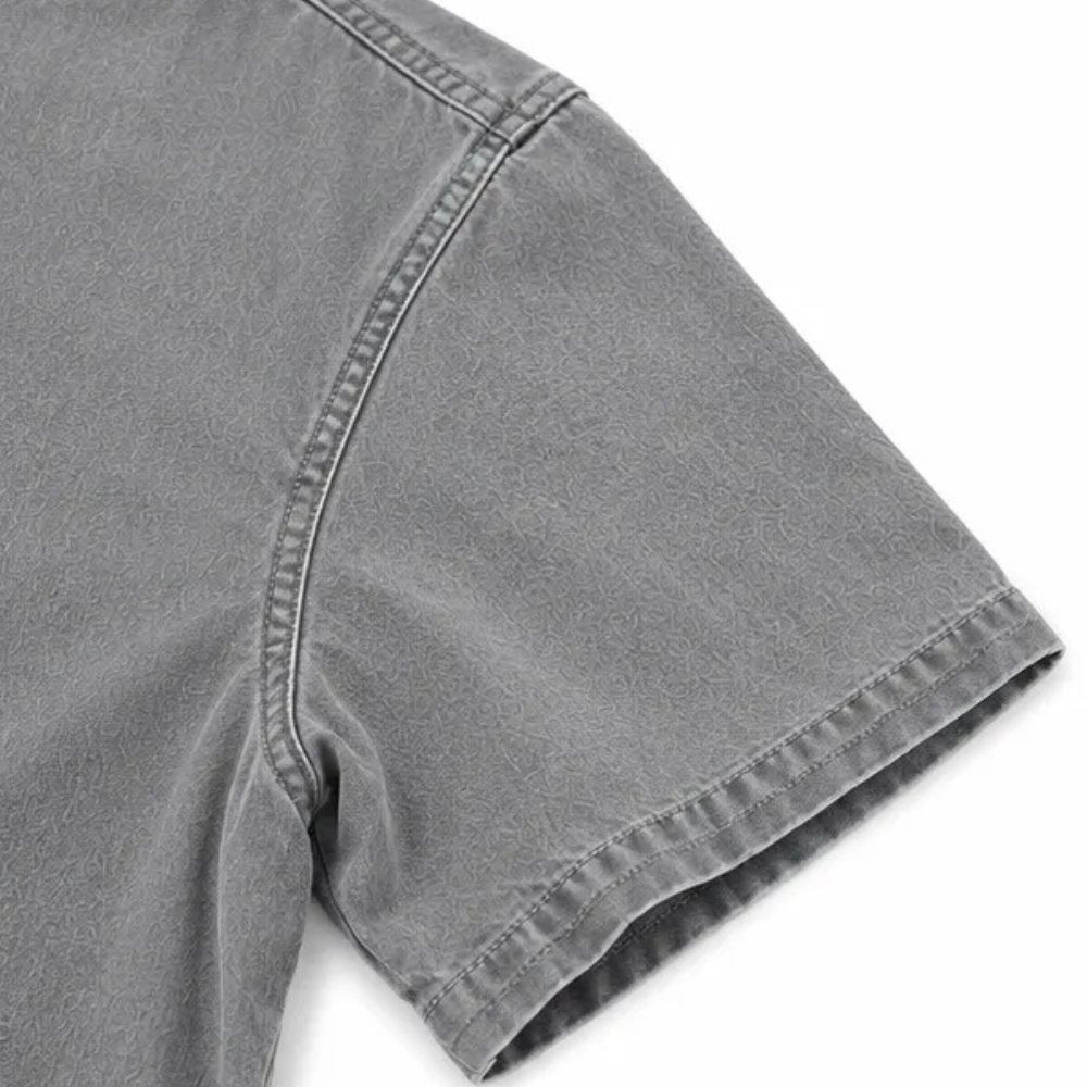 Soft women's Henley tunic top, short sleeve, relaxed fit, stylish side buttons for daily wear.