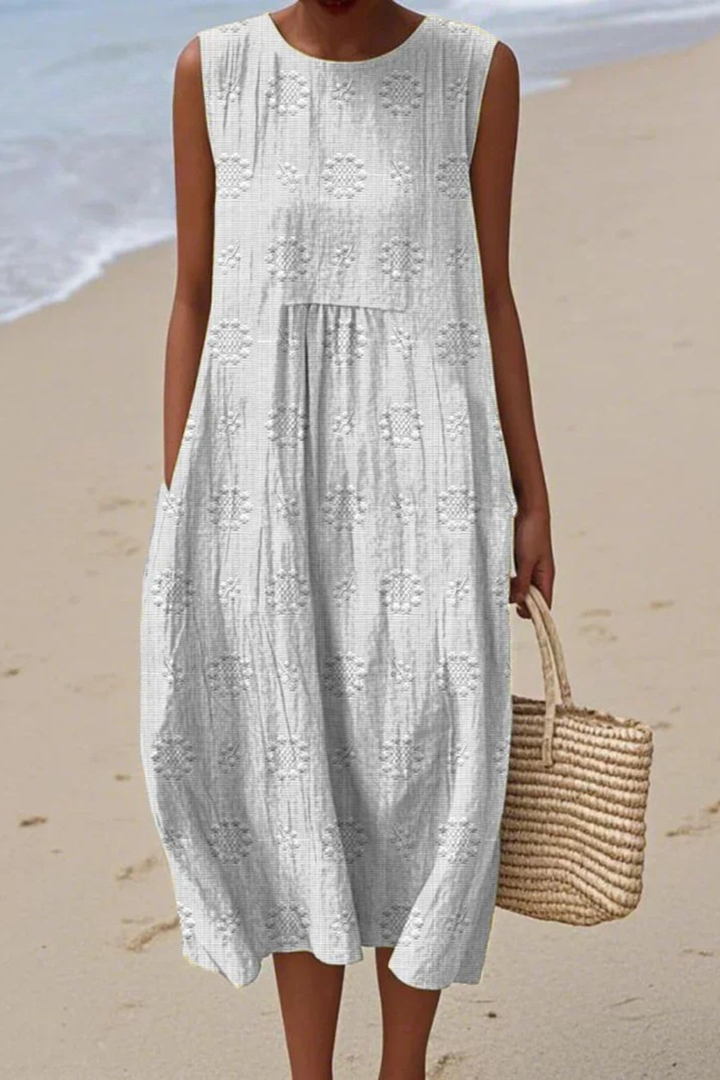 Colorful embroidered sleeveless maxi dress for women, ideal for a comfortable & stylish summer look.