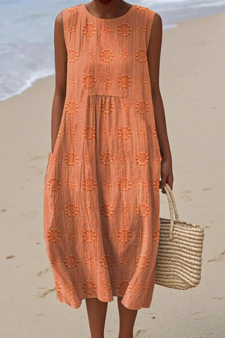Comfortable women's sleeveless maxi dress with intricate embroidery, versatile for summer casual wear.
