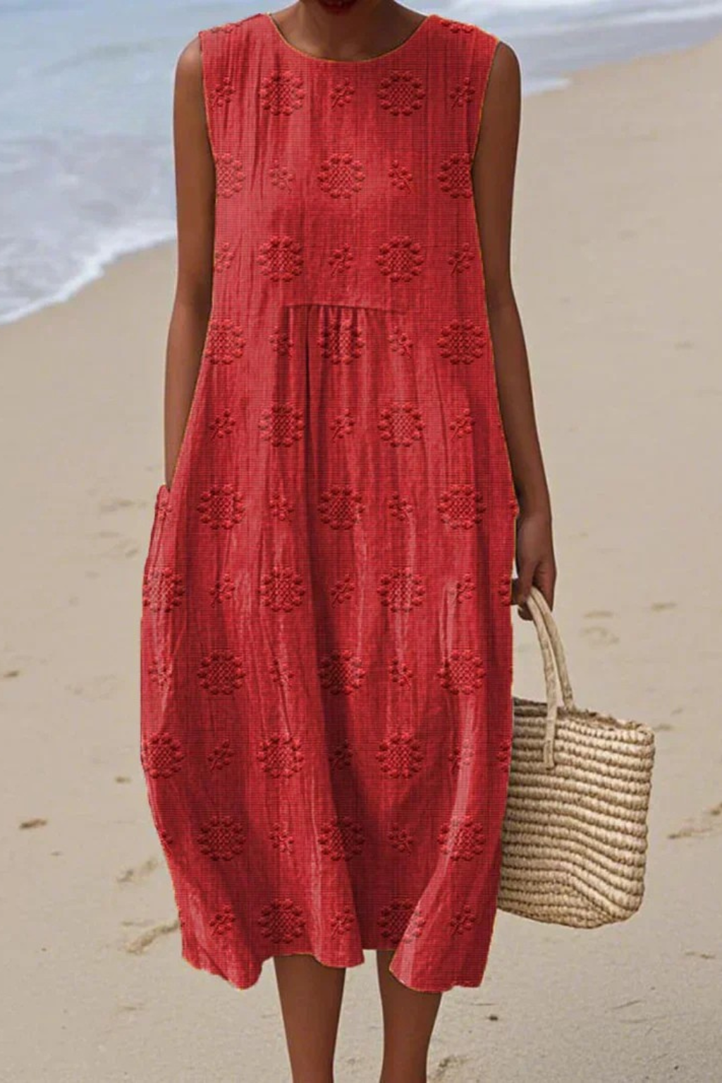Stunning embroidered sleeveless maxi dress for women, offering an elegant, flowing summer silhouette.