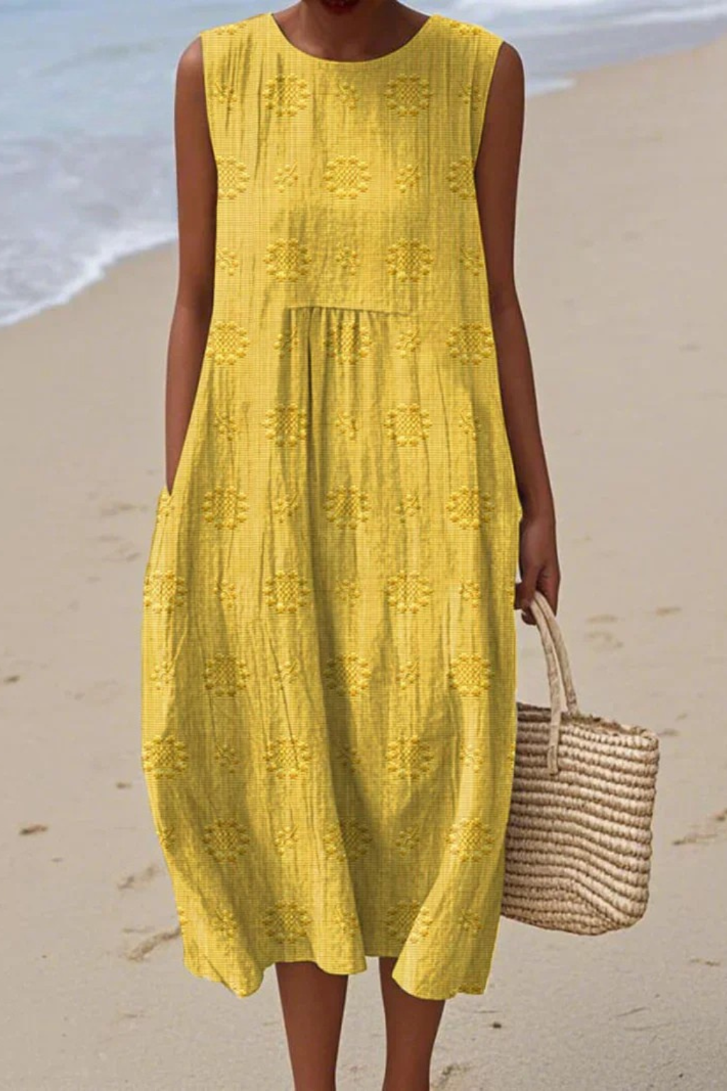 New elegant women's sleeveless maxi dress featuring beautiful embroidery, perfect for summer events.