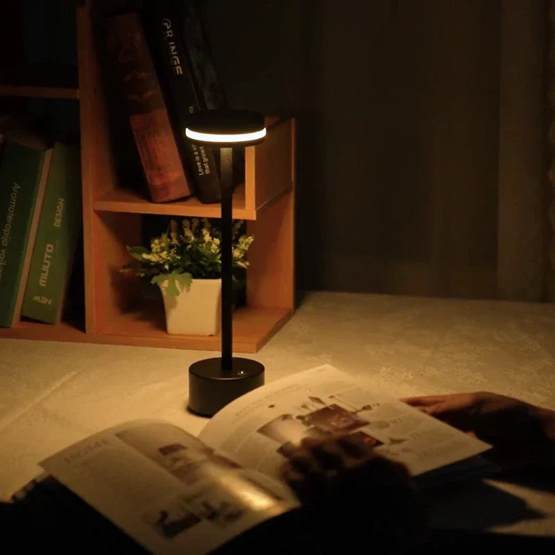 Nvroome modern LED table lamp, cordless and dimmable with touch control for atmospheric lighting.