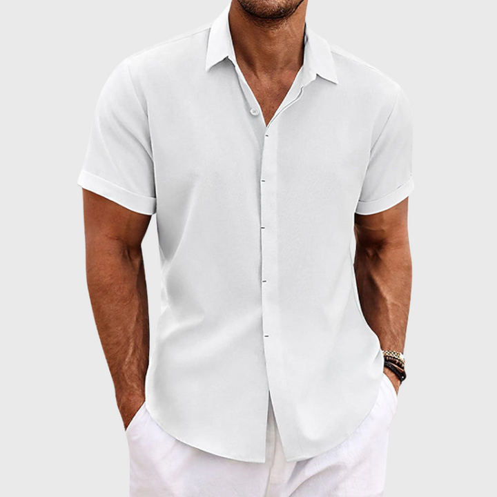 Men's stylish short sleeve button-up shirt, comfortable for summer vacation, beach trips, or casual events.