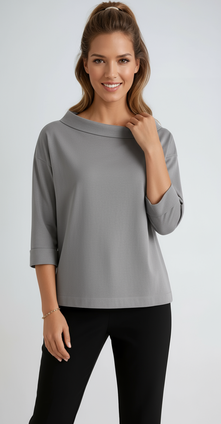 Versatile women's relaxed fit top with an elegant boat neck and 3/4 sleeves. Perfect for comfort and style.