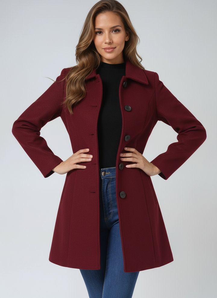 Elegant women's winter trench coat, single-breasted with tailored fit, suitable for city style.