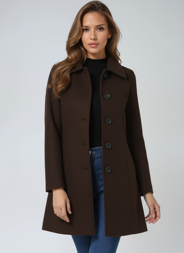 Tailored women's long trench coat, single-breasted, perfect winter outerwear for an elegant style.