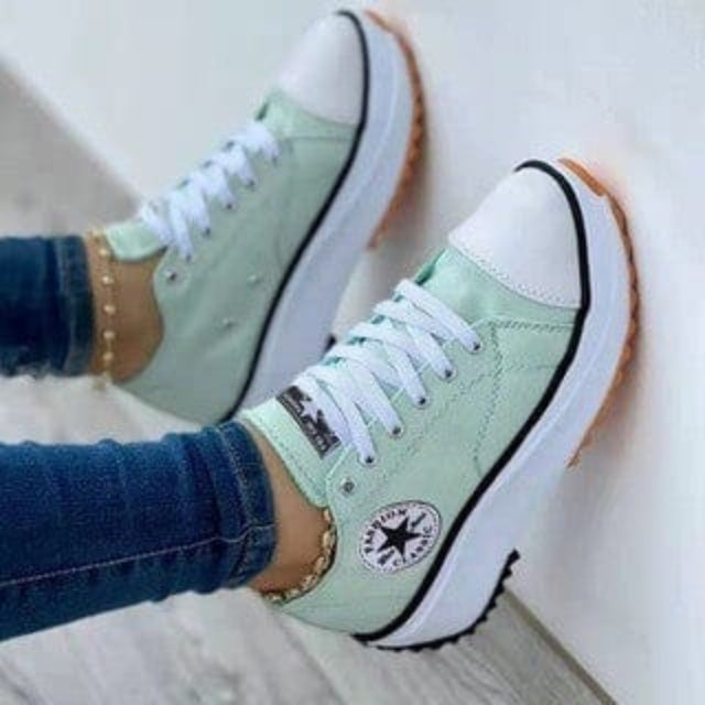 Textured material of women's orthopedic everyday sneakers, built for comfort & support.