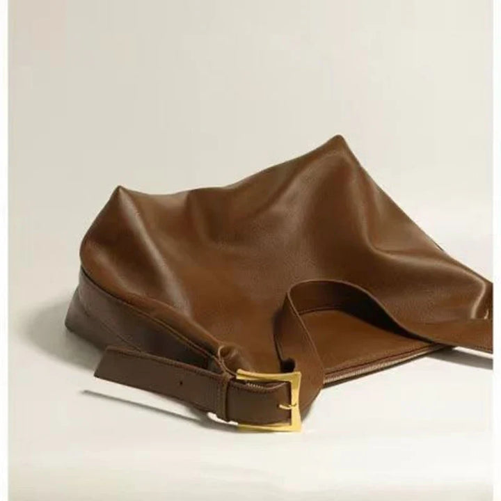 Front view of the elegant women's oversized shoulder bag, showcasing its sleek faux leather design.