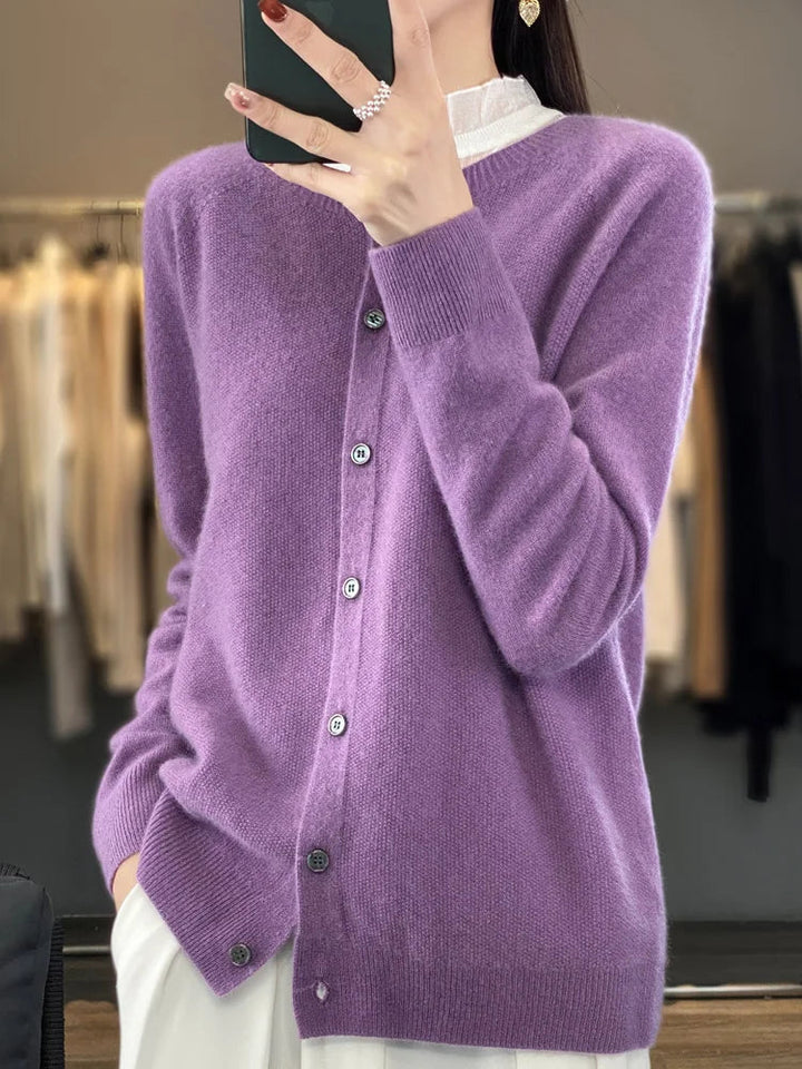 Elegant women's knit cardigan, a soft long-sleeve button-up sweater offering cozy comfort and style.