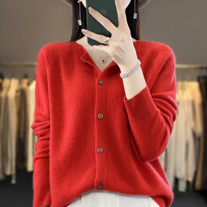 Women's elegant long-sleeve knit cardigan, a button-up sweater for a sophisticated and cozy look.