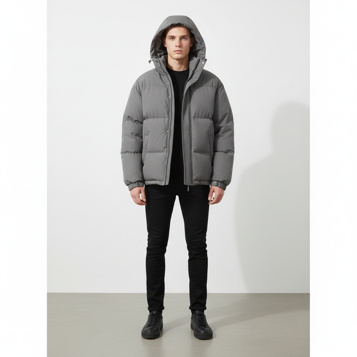 Premium men's quilted winter jacket. Warm, windproof, and durable for stylish cold weather protection.