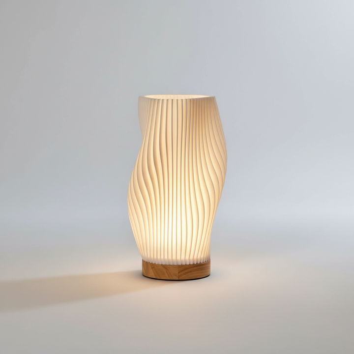 Elegant wave design table lamp, ideal for modern home decor. Creates enchanting mood lighting in any living space.
