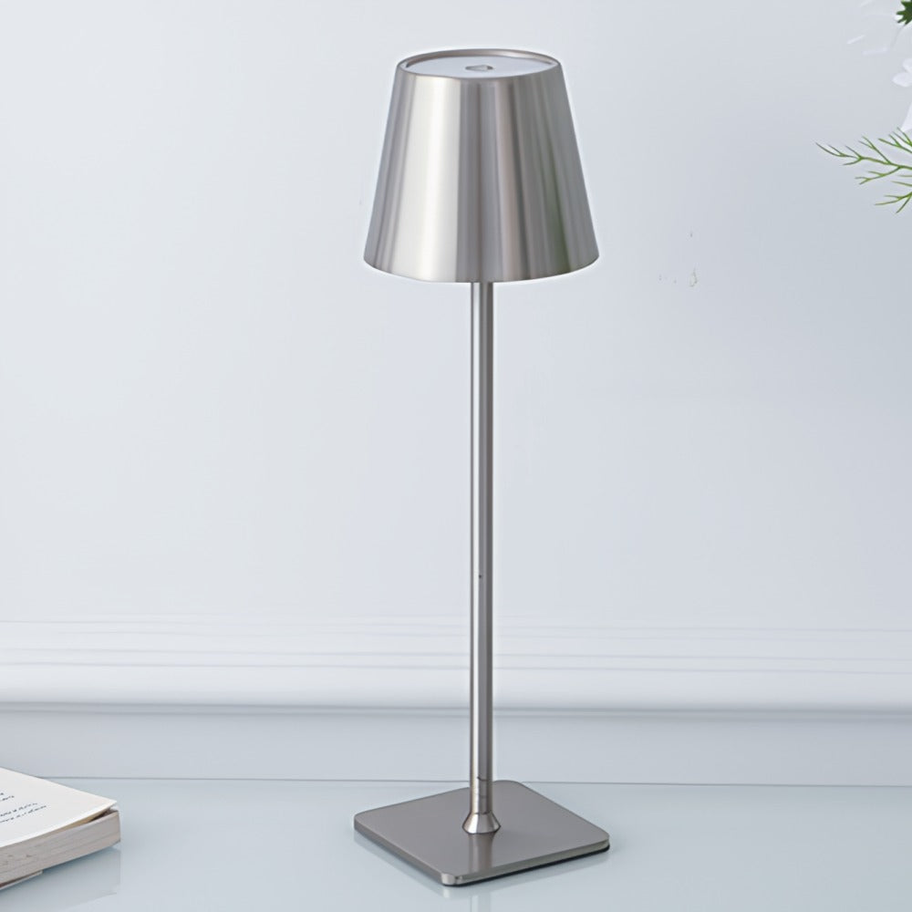 Stylish modern LED table lamp, dimmable, rechargeable. Perfect portable light for any setting.