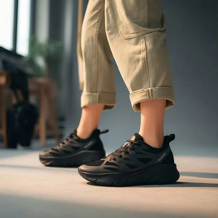 Anti-fatigue women's work sneakers, lightweight and supportive for active healthcare professionals.