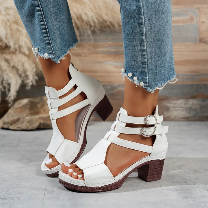 Women's chic block heel sandals with buckle strap, perfect for versatile summer outfits.